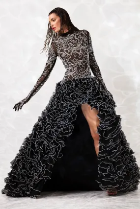 Black sheer gown with built in gloves embroidered with waves of white silk threads and micro beads and a ruffled skirt in silk organza