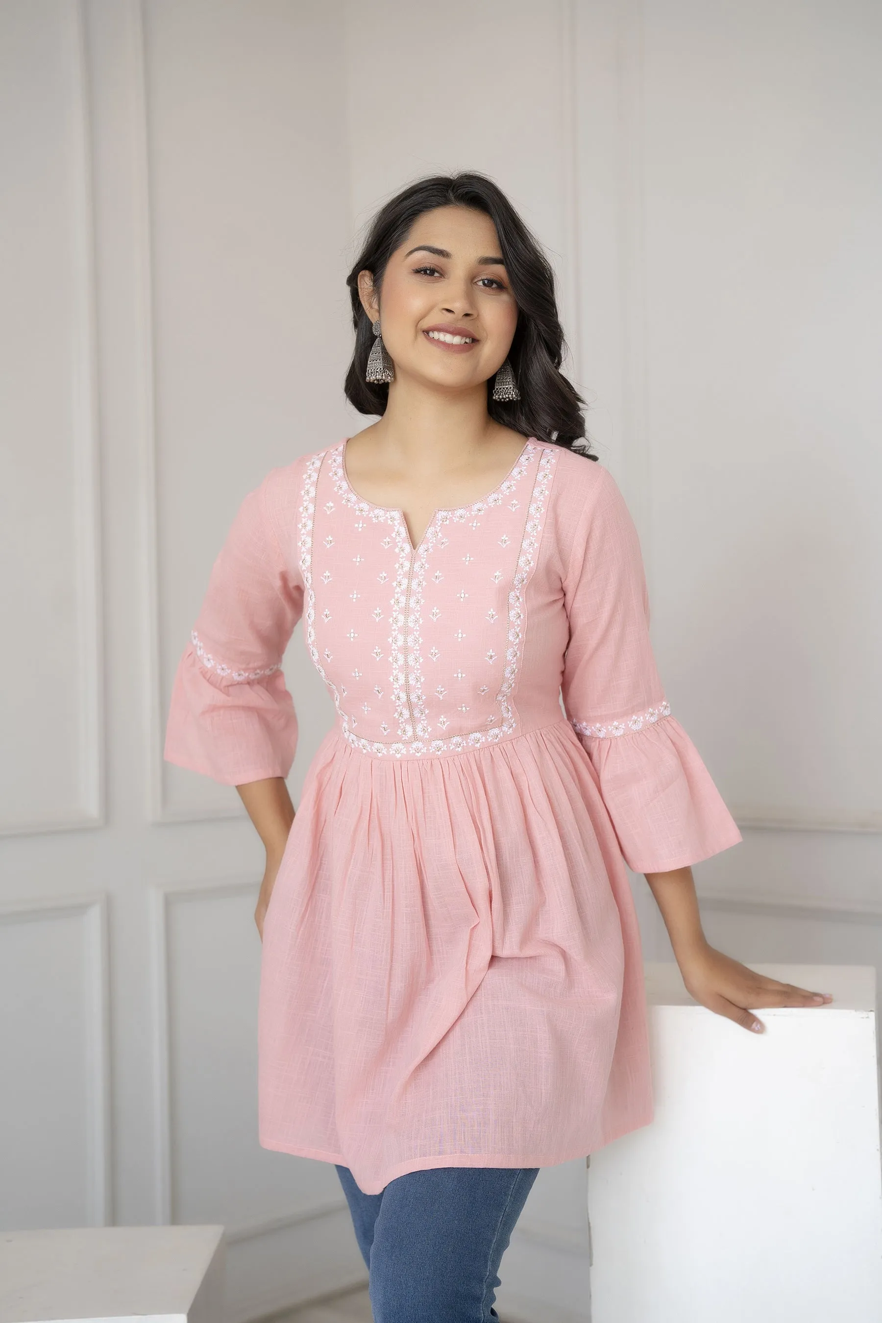 Women Pink Embroidered Peplum Tunic