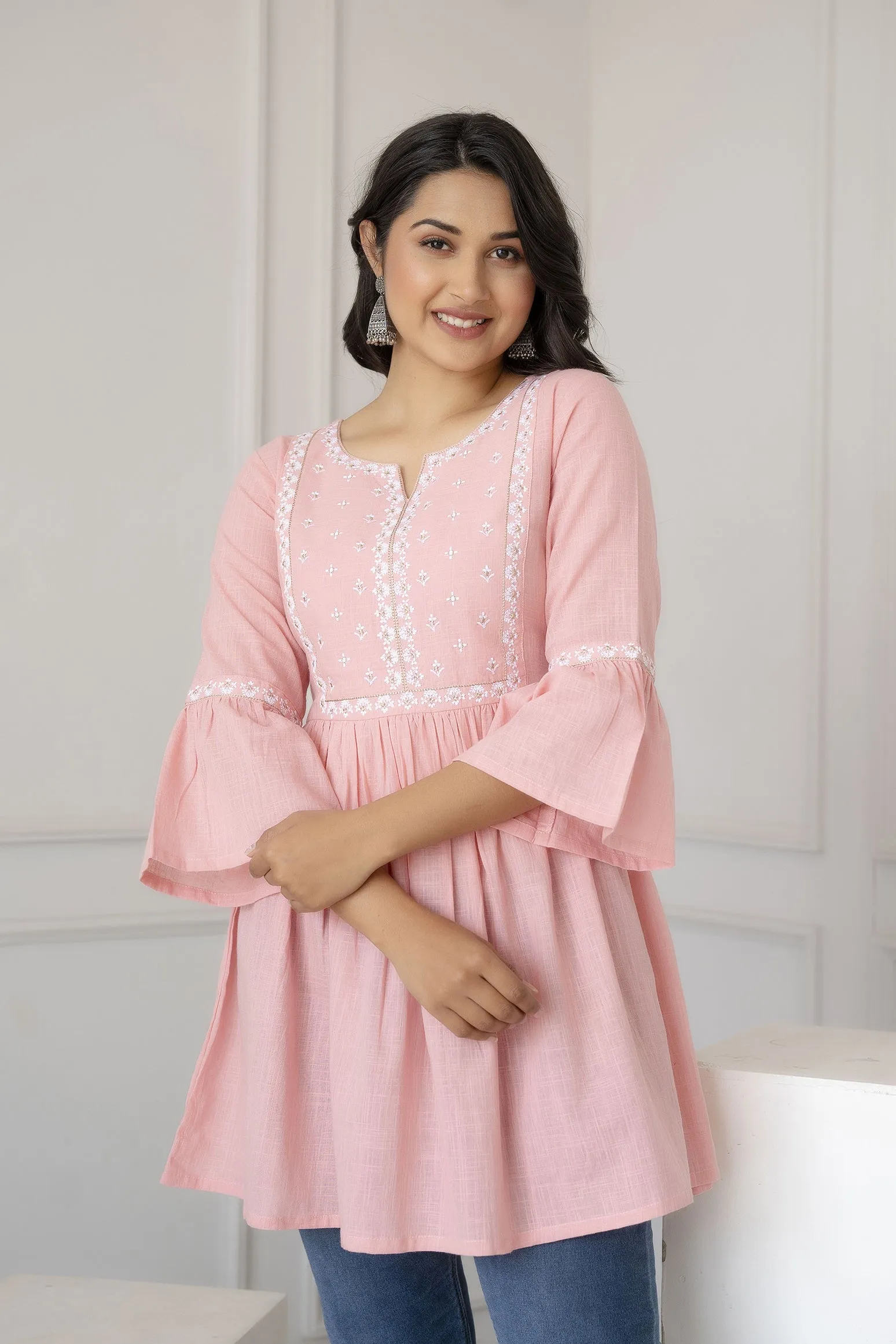 Women Pink Embroidered Peplum Tunic